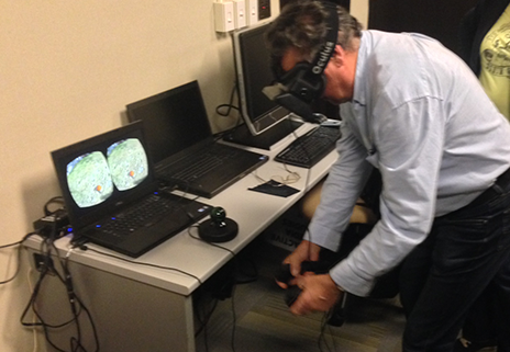 man using virtual reality equipment