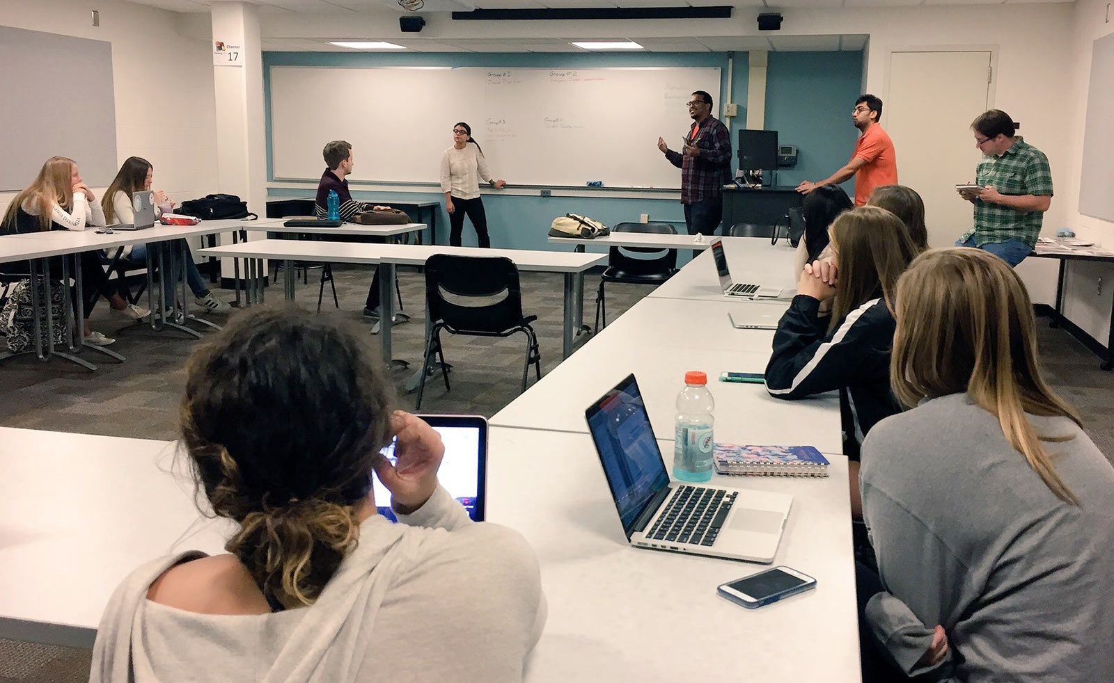 xdMFA students leading a discussion in a classroom