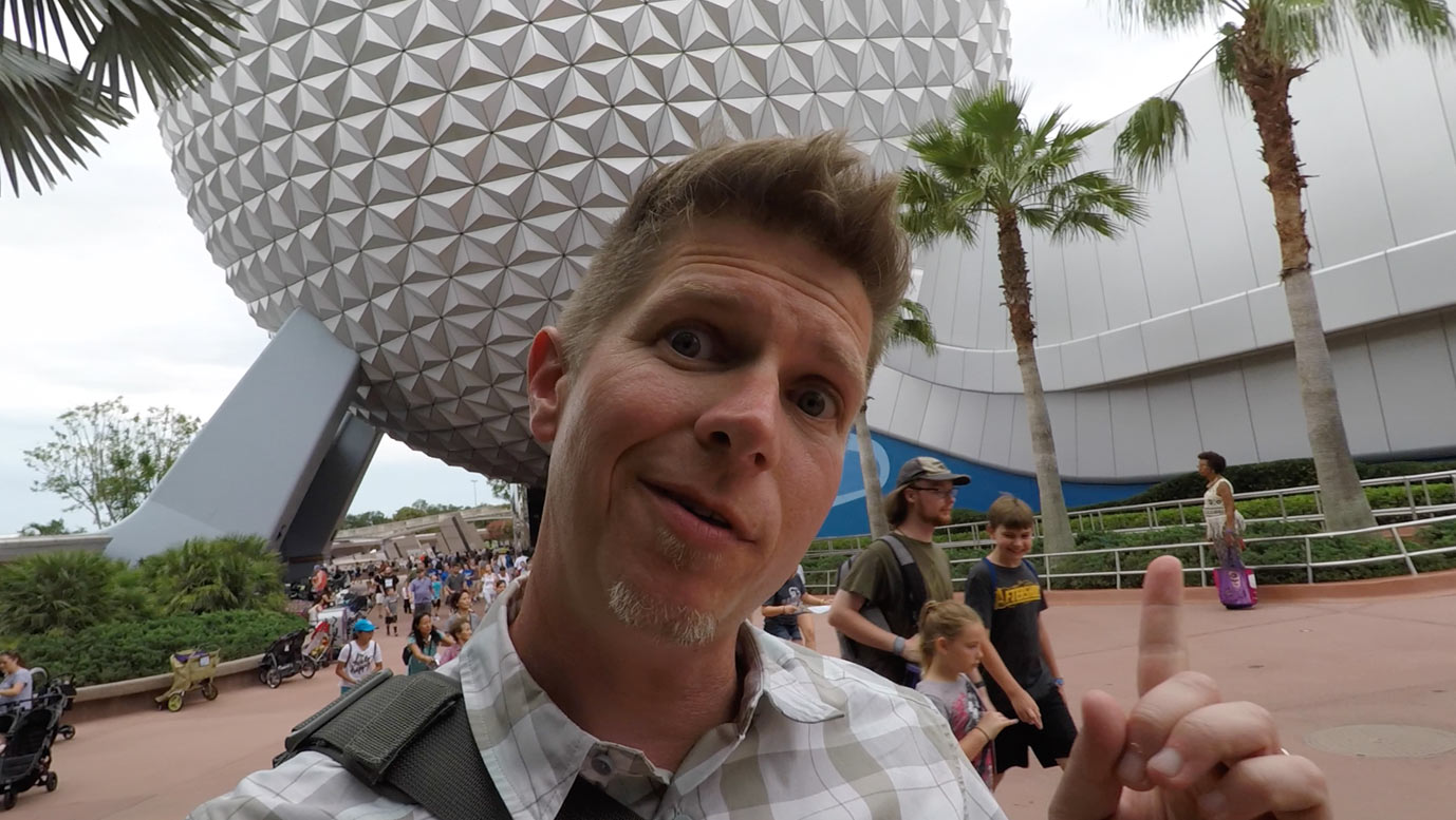 Dennis Cheatham at Epcot Center making a silly face.