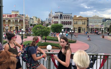 Disney Cast Member speaks with students.